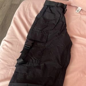 small black windbreaker cargos